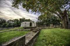 The Capitol Building Ruins at Capitol Park. The foundation and the standing northern wall of the interior rotunda are featured. The foundation provides an unbroken perimeter showing the outline of where the building once stood. Capitol Park, Tuscaloosa, AL by Carol Highsmith, from the Library of Congress, 2010 12