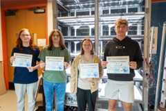 Kentucky students holding certificates