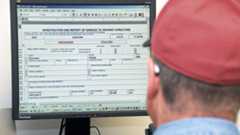 Man at computer using TransGIS tool