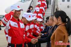 China's Yunnan rescue team returns from Myanmar