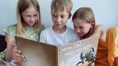 Kids with the book