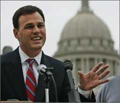  In this Tuesday, Sept. 9, 2008 file photo, Oklahoma state Sen. Andrew Rice , D-Okla., candidate for the U.S. Senate from Oklahoma, gestures as he speaks outside the state Capitol in Oklahoma City. Rice who is running against Republican incumbent Jim Inhofe is finding a tough opponent, who takes credit for being the "most conservative member of the Senate." (AP Photo/File)