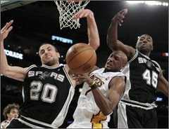  San Antonio Spurs guard Manu Ginobili, left, of Argentina, is defended by Los Angeles Lakers forward Lamar Odom during the first half of an NBA basketball game in Los Angeles on Sunday, April 4, 2010. At right is San Antonio Spurs forward DeJuan Blair. (AP Photo/Jae C. Hong)