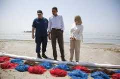 President Obama, LaFourche Parish president Charlotte Randolph, right, and U.S. Coast Guard Admiral Thad Allen, National Incident Commander for the BP Deepwater Horizon oil spill, look Friday at booms laid out to collect oil during a tour of areas impacted by the Gulf Coast oil spill.
