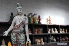 In pics: painted sculpture art in Dunhuang