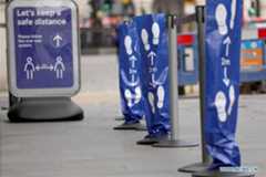 Signs shown in London to encourage social distancing