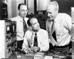 John Bardeen, William Shockley and Walter Brattain in 1948, Courtesy of Bell Telephone Laboratories