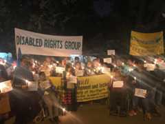 Candlelight vigil seeking early passage of Bill for RPWD