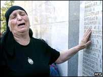 Woman cries at memorial in Tbilisi dedicated to Georgians killed in Abkhaz conflict