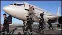French military rescuers arrive at the airport of Port-au-Prince, 14 January 2010