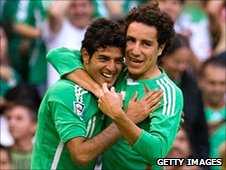 Carlos Vela (left) and Efrain Juarez