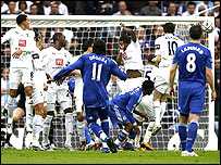 Chelsea's Didier Drogba curls home the opening goal at Wembley