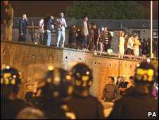 Riot police and fans outside Upton Park