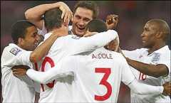 England players congratulate Wayne Rooney (second left) after his goal in the 5-1 win over Croatia