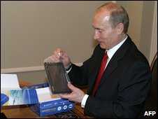 President Vladimir Putin examines Glonass equipment in 2007 (AFP)