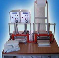 Image of Mini sanitary napkin making machine