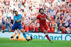 LIVERPOOL, ENGLAND - Sunday, August 27, 2017: Liverpool's Mohamed Salah celebrates scoring the third goal during the FA Premier League match between Liverpool and Arsenal at Anfield. (Pic by David Rawcliffe/Propaganda)
