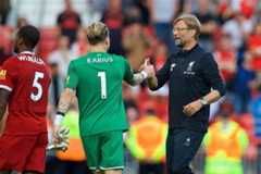 LIVERPOOL, ENGLAND - Sunday, August 27, 2017: Liverpool's manager J&uuml;rgen Klopp and goalkeeper Loris Karius after the 4-0 victory over Arsenal during the FA Premier League match between Liverpool and Arsenal at Anfield. (Pic by David Rawcliffe/Propaganda)