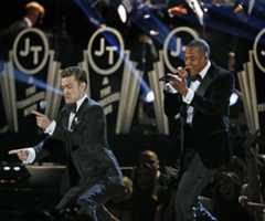 Justin Timberlake, left, performs his song "Suit and Tie," featuring rapper Jay-Z at the 55th Grammy Awards.