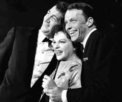Judy Garland is flanked by Dean Martin, left, and Frank Sinatra in a still from the television concert special "The Judy Garland Show," directed by Norman Jewison.