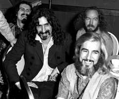Frank Zappa, center, and the Mothers of Invention attend the Grammy Awards at the New York Hilton, one of four sites for the 1968 awards. 