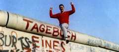 Liam Jeory straddles the Berlin Wall