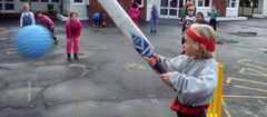 Children playing Kiwi cricket at Hataitai School, 1994