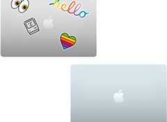 A closed silver Mac laptop covered with stickers and a closed Sky Blue MacBook Air with no stickers.