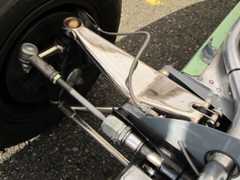 The front anti-sway bar is non-adjustable, difficult to swap out, and impossible to see in this photo.