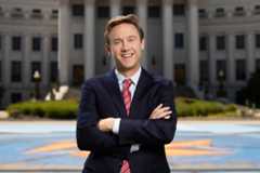 Mayor Mike Johnston in front of City and County Building