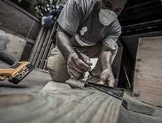 Man using tools to mark before a cut