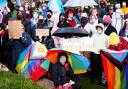People take part in a Resisting Transphobia counter protest outside the Scottish Parliament in Holyrood, Edinburgh, November 1, 2025.
