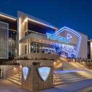 The maker of Callaway golf clubs has agreed to sell its majority stake in Topgolf