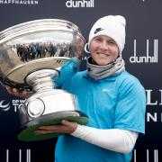 Robert McIntyre poses with the trophy