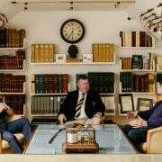 Hugh Sutherland (pictured centre) takes the lead in showing people around the archive room at Nairn