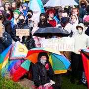 People take part in a Resisting Transphobia counter protest outside the Scottish Parliament in Holyrood, Edinburgh, November 1, 2025.