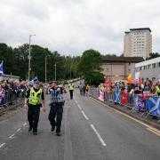 Anti-migrant protesters and anti-racism protesters separated by police in Falkirk Image: PA