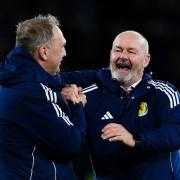 Manager Steve Clarke clearly enjoying his team's triumph against Denmark.