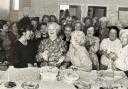 The Mayor of Burnley, Councillor Irene Cooney and mangageress Kath Raiostrick cut the second birthday cake of the Imperial Cancer Research Fund shop in Burnley in 1991 watched by regional shop organiser Karen Lawson, left, and volunteers