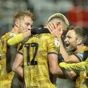 Blackburn Rovers' Lewis Miller celebrates scoring the opening goal.
