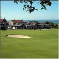 View of the clubhouse from behind the 9th/18th green