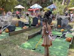 kids playing mini golf
