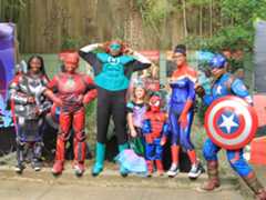 costumed characters with kids