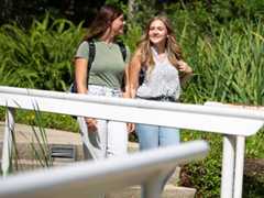 two students walking on the pensacola campus