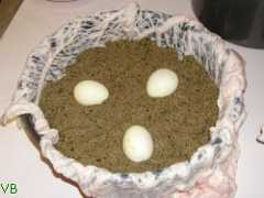 Ground meat mixed with eggs and greens