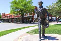 Bronze sculpture of Wyatt Earp in Dodge City, Kansas. Image credit Michael Rosebrock via Shutterstock