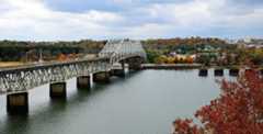 Beautiful fall view of Oneal Bridge over the Tennessee River at Florence, Alabama.