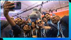 A picture of a group of people at Dreamforce taking a selfie.