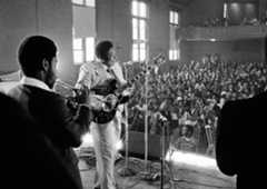 Blues musician B.B. King played to a packed auditorium of residents and press at the Massachusetts Correctional Institution in Norfolk, Mass., April 3, 1978. King has been playing to prison crowds since 1972 when he and Boston attorney F. Lee Bailey formed the Foundation for the Advancement of Inmate Rehabilitation and Recreation, an inmate services organization. (AP Photo/Michael S. Gordon)