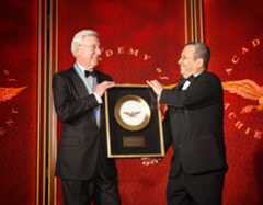 Home Depot co-founder Bernard Marcus receives the Golden Plate from former Israeli Prime Minister Ehud Barak.